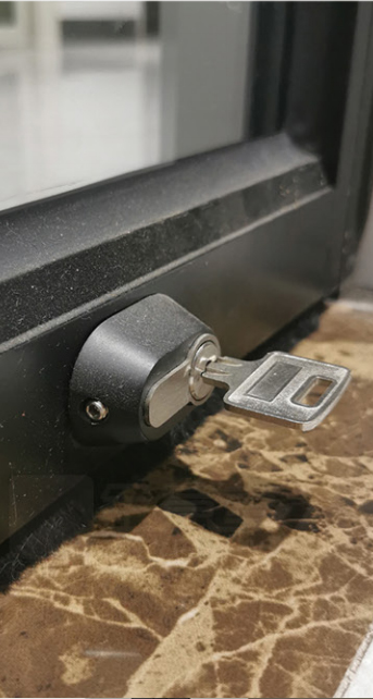 Pivot Door Floor Lock Key Close Up